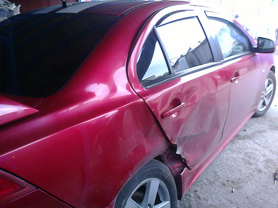 Ремонт кузова автомобиля Митсубиси Лансер (Mitsubishi Lancer) после ДТП